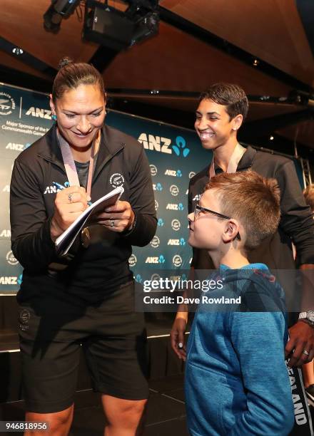 Dame Valerie Adams, silver medal for shot put and Alexis Pritchard, bronze medal for boxing sign autographs during the Welcome Home Function at...