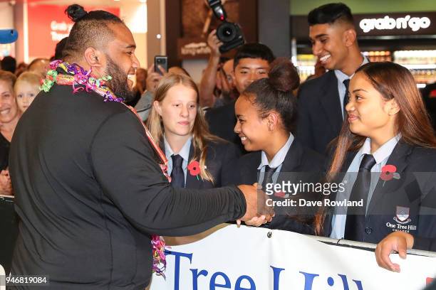 David Liti gold medal for Weightlifting meets schoolchildren during the Welcome Home Function at Novotel on April 16, 2018 in Auckland, New Zealand.