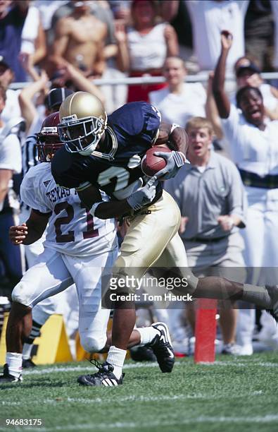 Javin Hunter of the Notre Dame Fighting Irish carries the ball during the game against the Texas A&M Aggies at Notre Dame Stadium on September 2,...