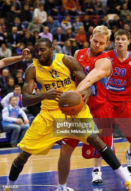 Stephane Lasme, #12 of Maccabi Electra Tel Aviv competes with Anton Ponkrashov, #18 of CSKA Moscow during the Euroleague Basketball Regular Season...