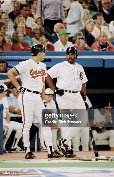 Cal Ripken Jr. #8 of the Baltimore Orioles and Cecil Fielder of the Detroit Tigers wait in the on-deck circle during the1991 All-Star Game at the...