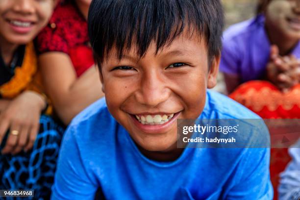 burmese children having fun in temple, old bagan, myanmar - burma stock pictures, royalty-free photos & images