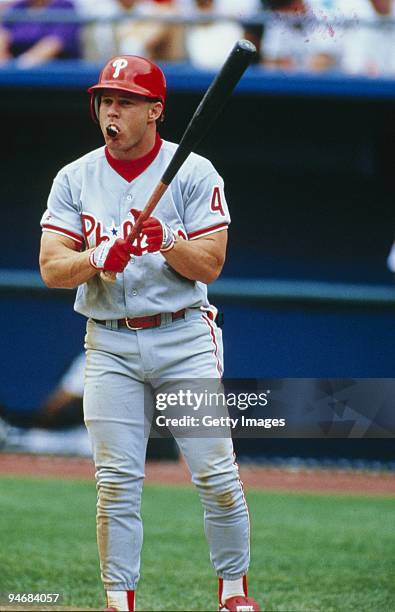 Lenny Dykstra of the Philadelphia Phillies steps to the plate with chewing tobacco visible in his mouth during the game against the Colorado Rockies...