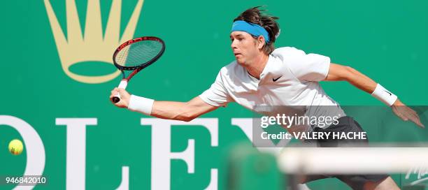 Jared Donaldson reaches out to the ball during his round of 64 tennis match against Spain's Albert Ramos-Vinolas at the Monte-Carlo ATP Masters...