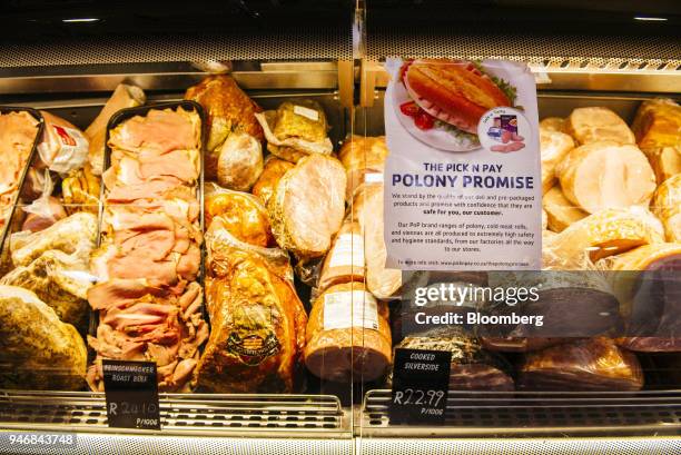 Notice displaying information regarding quality of processed meat products hangs at the delicatessen counter inside a Pick n Pay Stores Ltd....