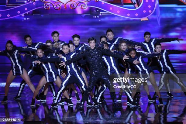 Singer Wang Leehom performs on the stage during the opening ceremony of 2018 Beijing International Film Festival at Yanqi Lake International...