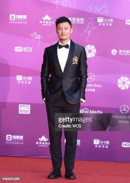 Actor Shawn Yue arrives at red carpet during the opening ceremony of 2018 Beijing International Film Festival at Yanqi Lake International Convention...