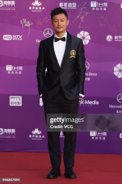 Actor Shawn Yue arrives at red carpet during the opening ceremony of 2018 Beijing International Film Festival at Yanqi Lake International Convention...