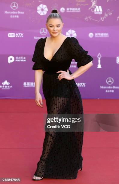 American actress Chloe Grace Moretz arrives at red carpet during the opening ceremony of 2018 Beijing International Film Festival at Yanqi Lake...