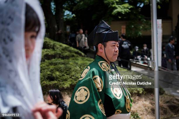 Gyoji waits during 'Honozumo' ceremonial on April 16, 2018 in Tokyo, Japan. This annual offering of a Sumo Tournament to the divine at the Yasukuni...