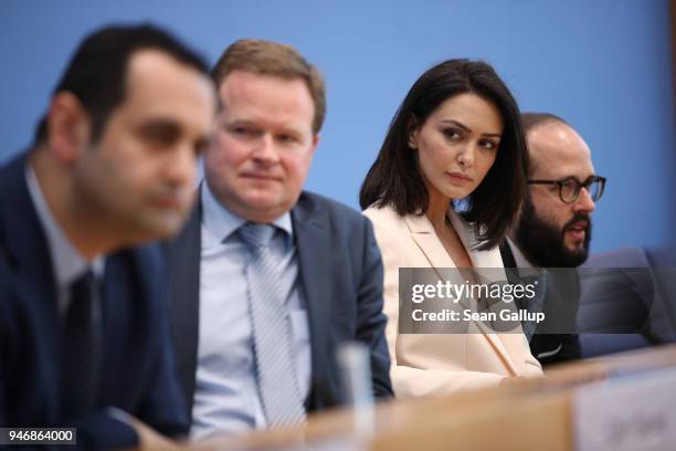 Iranian-born actress and human rights advocate Nazanin Boniadi sits with German politicians and Bundestag members Bijan Djir-Sarai and Frank Schwabe...