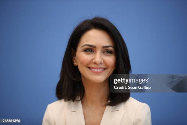 Iranian-born actress and human rights advocate Nazanin Boniadi speaks to the media with members of the Bundestag on April 16, 2018 in Berlin,...