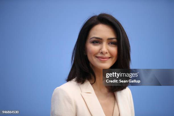 Iranian-born actress and human rights advocate Nazanin Boniadi speaks to the media with members of the Bundestag on April 16, 2018 in Berlin,...