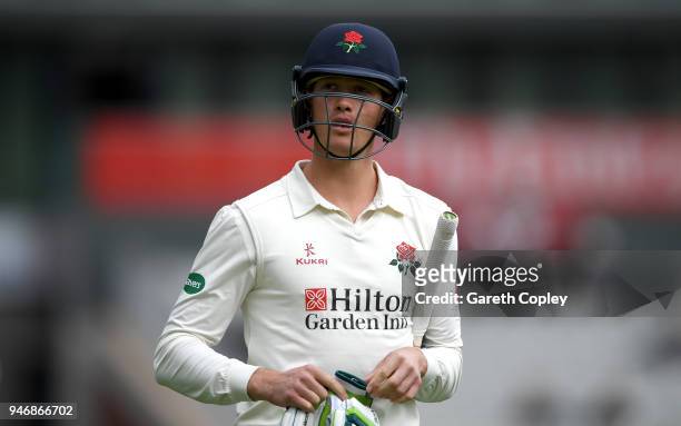 Keaton Jennings of Lancashire leaves the field after being dismissed by Harry Gurney of Nottinghamshire during the four day of Specsavers County...