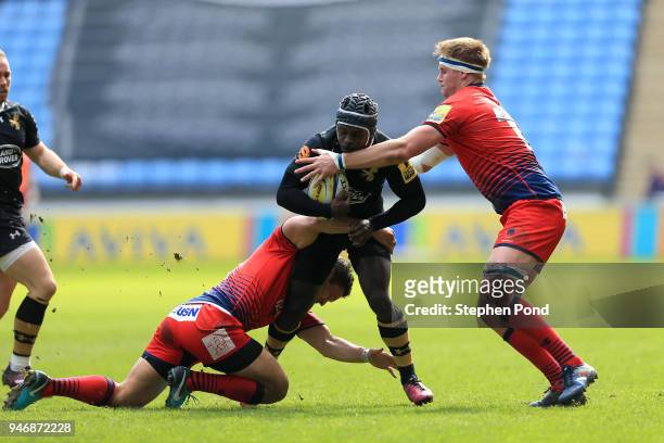 Christian Wade of Wasps is tackled by Jackson Wilson of Worcester Warriors during the Aviva Premiership match between Wasps and Worcester Warriors at...