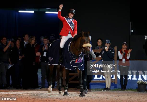 Elizabeth Beezie Madden of USA riding Breitling LS celebrates during the trophy cerermony winning the FEI World Cup Jumping Final during the FEI...