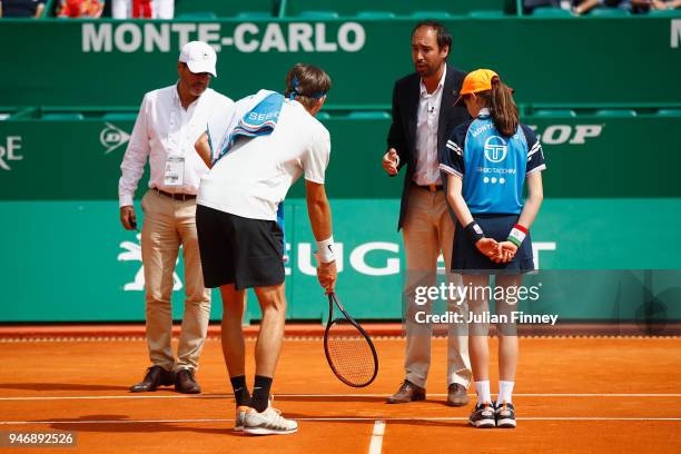 Jared Donaldson of the USA argues with umpire Arnaud Gabas of France in his match against Albert Ramos-Vinolas of Spain during day two of ATP Masters...