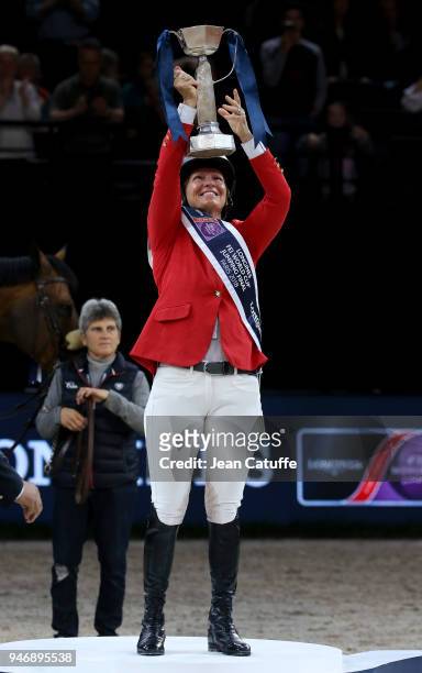 Elizabeth Beezie Madden of USA riding Breitling LS celebrates during the trophy cerermony winning the FEI World Cup Jumping Final during the FEI...