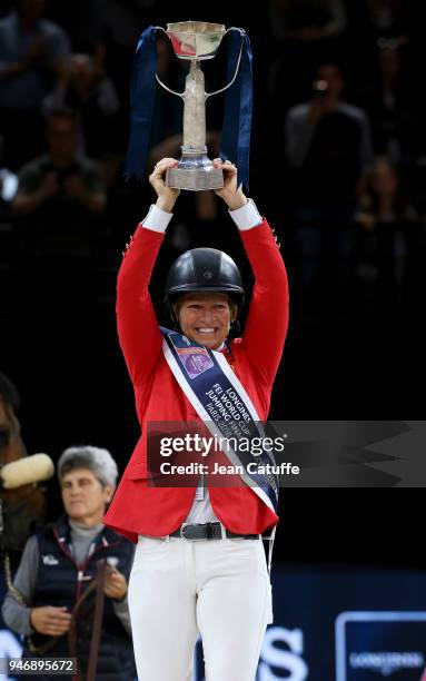 Elizabeth Beezie Madden of USA riding Breitling LS celebrates during the trophy cerermony winning the FEI World Cup Jumping Final during the FEI...