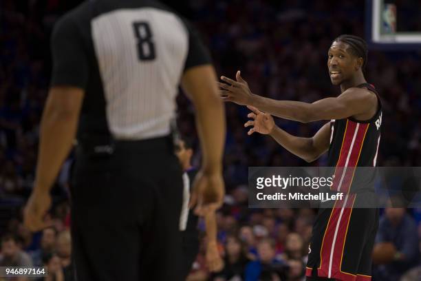 Josh Richardson of the Miami Heat talks to referee Marc Davis against the Philadelphia 76ers during Game One of the first round of the 2018 NBA...