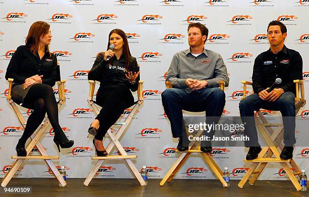 Danica Patrick , driver of the GoDaddy.com Chevrolet, speaks as JR Motorsports Vice President and General Manager Kelly Earnhardt , team owner Dale...