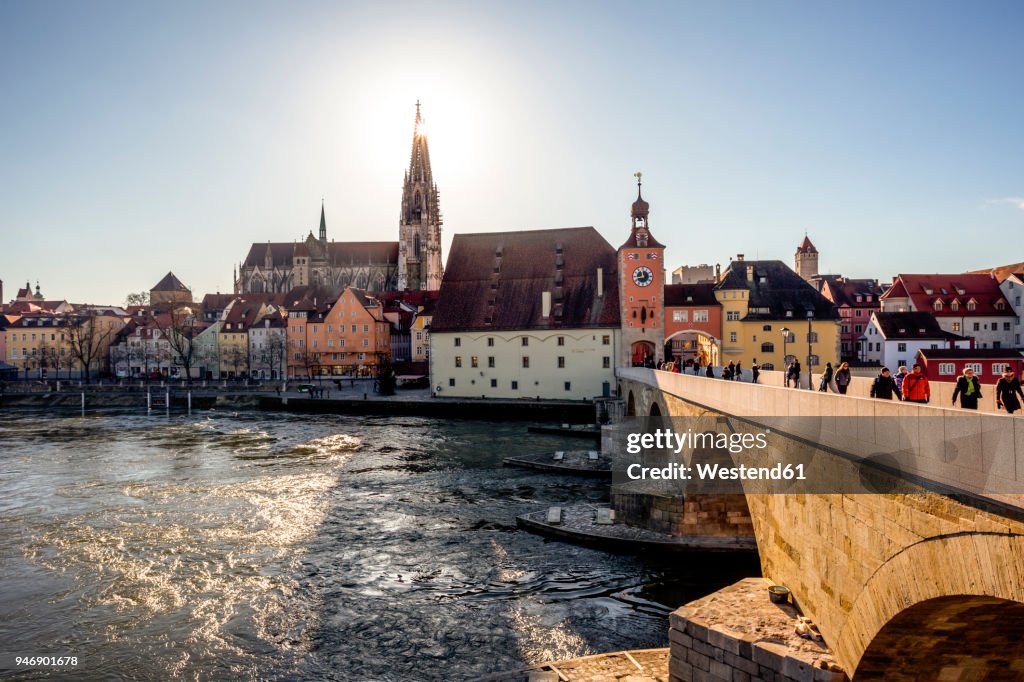 Germany, Regensburg, view to cathedral at the old town with Steinerne Bruecke over Danube river