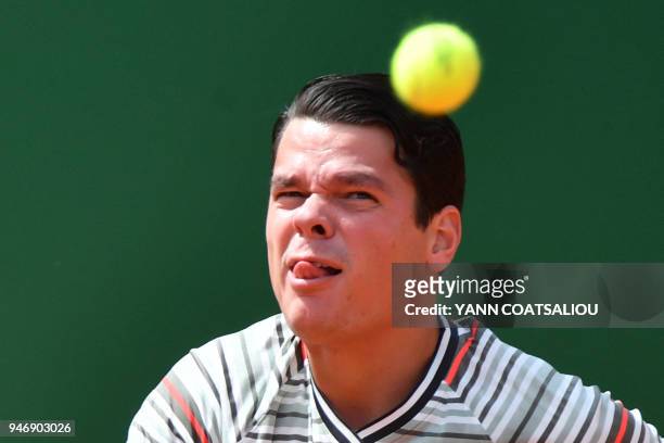 Canada's Milos Raonic eyes a ball during his round of 64 tennis match against Monaco's Lucas Catarina at the Monte-Carlo ATP Masters Series...