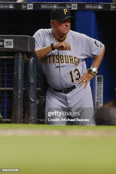 Clint Hurdle of the Pittsburgh Pirates looks on from the dugout against the Miami Marlins at Marlins Park on April 13, 2018 in Miami, Florida.