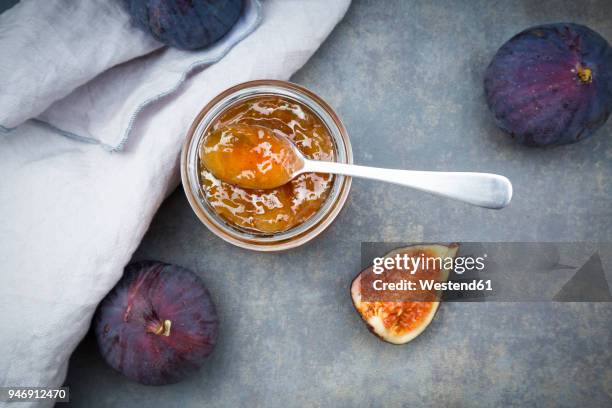 organic figs and a glass of fig jam - jelly foto e immagini stock