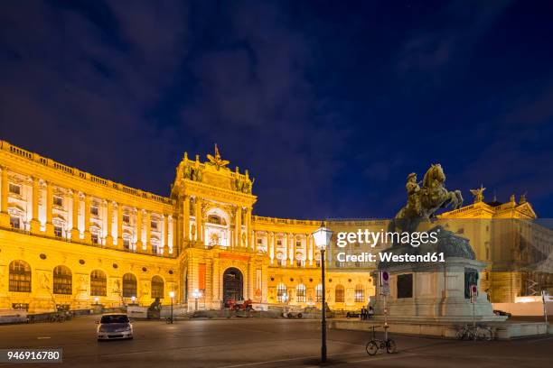 austria, vienna, neue hofburg part of hofburg palace with monument prince eugen in the foreground - hofburg stock pictures, royalty-free photos & images