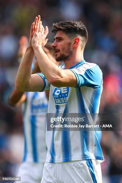 Christopher Schindler of Huddersfield Town applauds the fans at full time during the Premier League match between Huddersfield Town and Watford at...