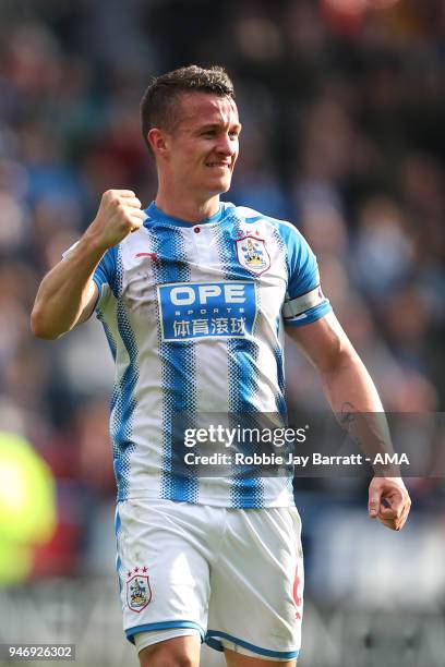 Jonathan Hogg of Huddersfield Town celebrates at full time during the Premier League match between Huddersfield Town and Watford at John Smith's...