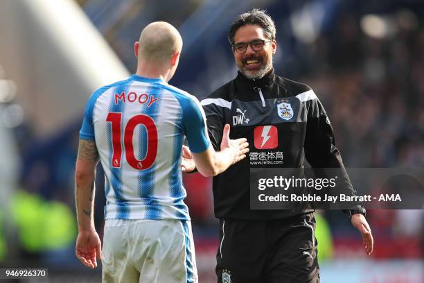 Aaron Mooy of Huddersfield Town and David Wagner head coach / manager of Huddersfield Town celebrate at full time during the Premier League match...