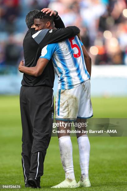 David Wagner head coach / manager of Huddersfield Town and Terence Kongolo of Huddersfield Town celebrate at full time during the Premier League...