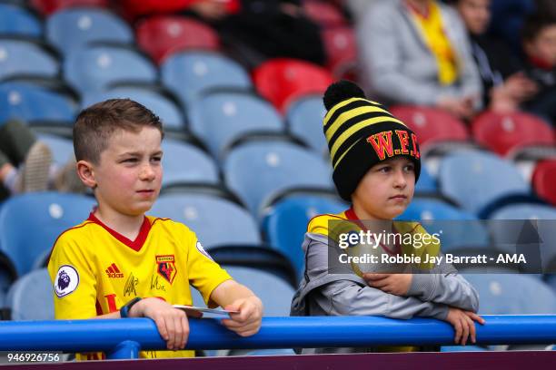 Young fans of Watford look on during the Premier League match between Huddersfield Town and Watford at John Smith's Stadium on April 14, 2018 in...