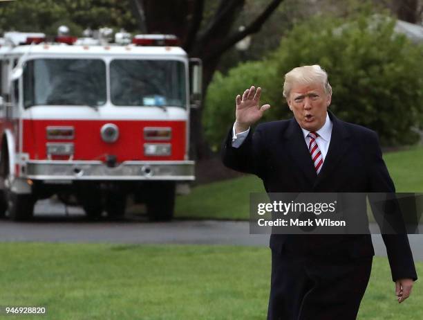 President Donald Trump walks toward Marine One while departing from the White House, on April 16, 2018 in Washington, DC. President Trump is...