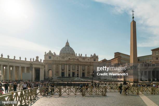 italy, lazio, rome, st. peter's square with obelisk and st. peter's basilica - st peter's square stock pictures, royalty-free photos & images