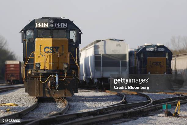 Transportation Inc. Freight train locomotives sit parked at a rail yard in Bowling Green, Kentucky, U.S., on Friday, April 13, 2018. CSX Corp. Is...