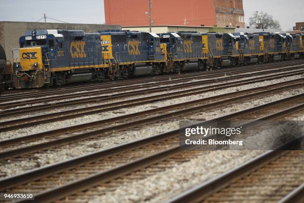 Transportation Inc. Freight locomotives sit parked on train tracks in Huntington, West Virginia, U.S., on Saturday, April 14, 2018. CSX Corp. Is...