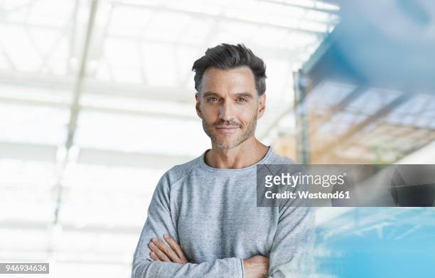 portrait of smiling mature man with stubble - stubble imagens e fotografias de stock