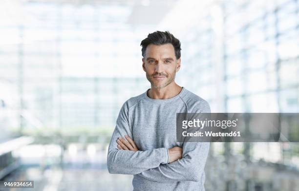 portrait of content mature man with stubble - hair stubble stockfoto's en -beelden