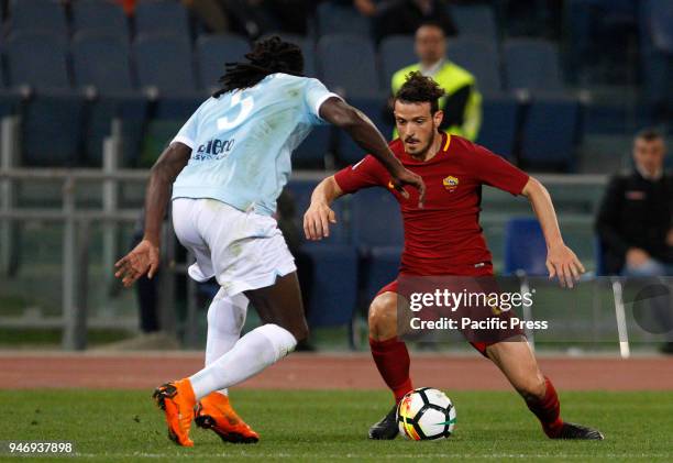 Roma's Alessandro Florenzi, right, is challenged by Lazio's Jordan Lukaku during the Serie A soccer match between Lazio and Roma at the Olympic...