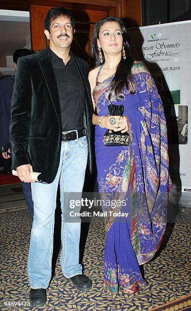 Director Kabir Khan with wife Mini Mathur pose during a fashion show named 'Mizwan - Sonnets in fabric' organised by actress Shabana Azmi for the...