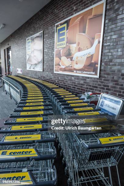 Edeka supermarket - advertising poster and shopping carts.