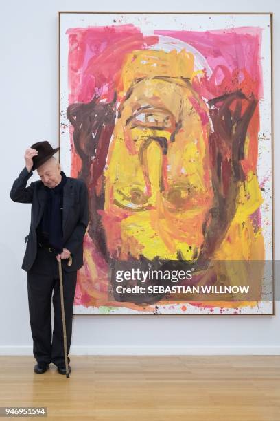 German artist Georg Baselitz poses next to his painting "Schwester Rosi III" from 1995 at his exhibition in Chemnitz, eastern Germany on April 16,...