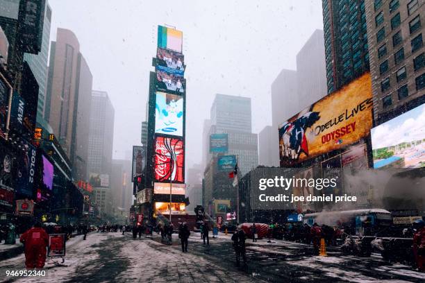 snowy, times square, new york city, new york, america - new york city snow stock pictures, royalty-free photos & images