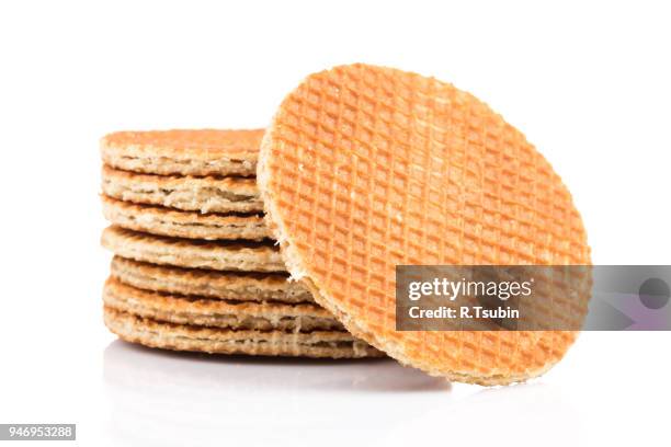dutch waffle isolated on a white background - stroopwafel foto e immagini stock