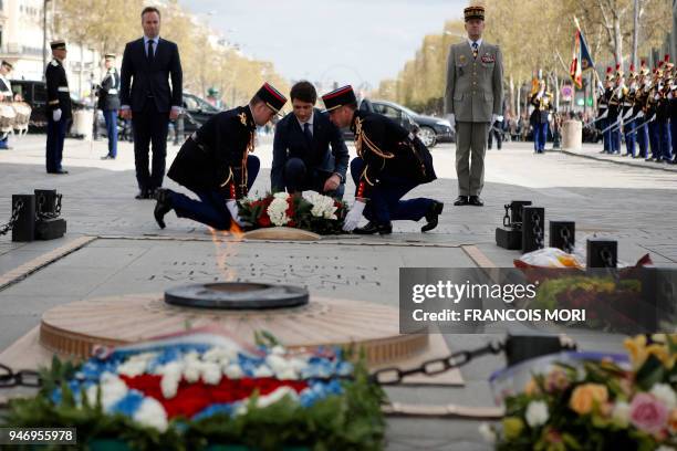 Canadian Prime Minister Justin Trudeau and French Junior Minister for Foreign Affairs Jean-Baptiste Lemoyne take part in a wreath laying ceremony on...