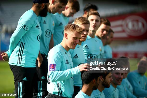 Scott Borthwick fools around during the Surrey CCC Photocall at The Kia Oval on April 16, 2018 in London, England.