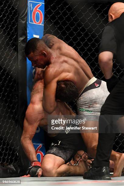 Alex Oliveira of Brazil attempts to submit Carlos Condit in their welterweight fight during the UFC Fight Night at Gila River Arena on April 14, 2018...